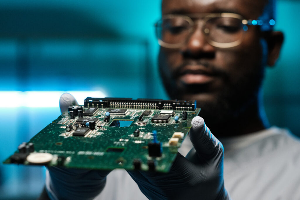 focused technician examining a computer circuit bo 2026 03 24 05 31 26 utc